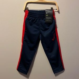 Nike Boys Midnight Navy w/ Red Stripe Dri-Fit pants